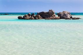 large stones in the turquoise lagoon