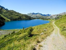 blue lake in Swiss Alps