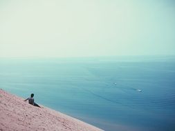 Sitting on the coast