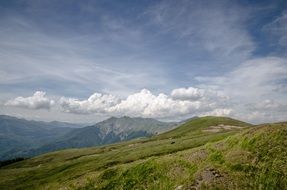 white clouds over the mountains