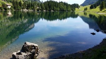 Calm lake among the Swiss Alps