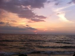 pink sunset over the coast in sri lanka