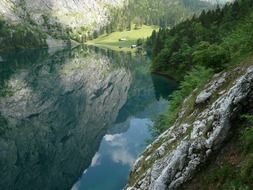 picturesque mountains are reflected in the lake