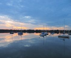 sailboats on a lake at the sunset, dallas, texas