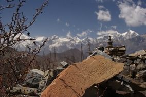 prayer on the stone of nepal mountains