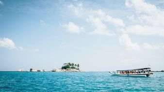 ocean sea boats island blue sky
