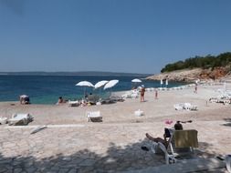 Picture of white parasols on a beach