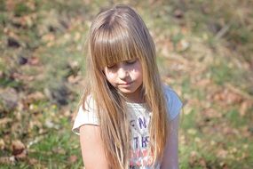 girl with long hair on nature