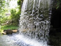 splashing waterfall in a wildlife park