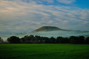 The mountain in the fog in the morning