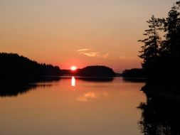 summer sunset at saimaa lake, finland