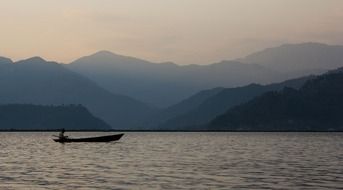picture of the small boat on a lake