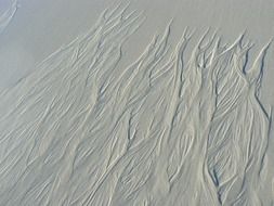 Waves on sand