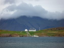 view from the water on the coast of Iceland