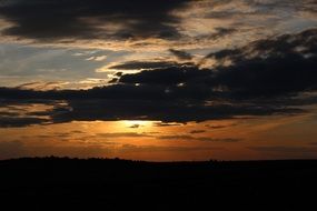 dark clouds at sunset