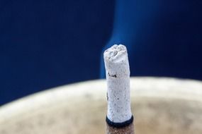 macro photo of burning cigarette