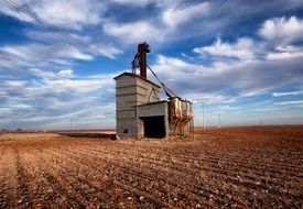 abandoned grain elevator on a farm field in Texas