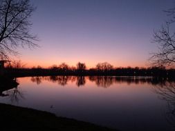 pink horizon on the lake during sunset