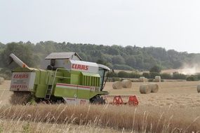 harvester on the field during harvesting