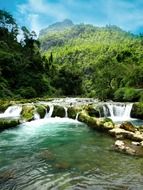 scenic green mountain waterfall in China