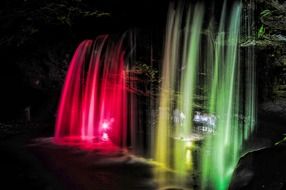 natural waterfall light up at night, japan