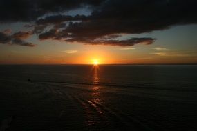 red sun over horizon sunset