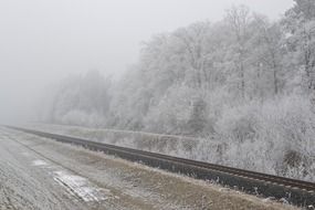 landscape of railway in fog