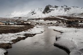 River near thewhite snowy mountains on the landscape