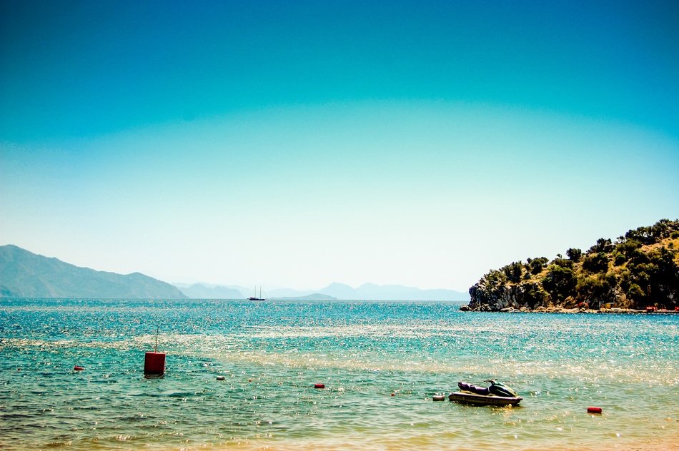 buoys and jet ski on the ocean