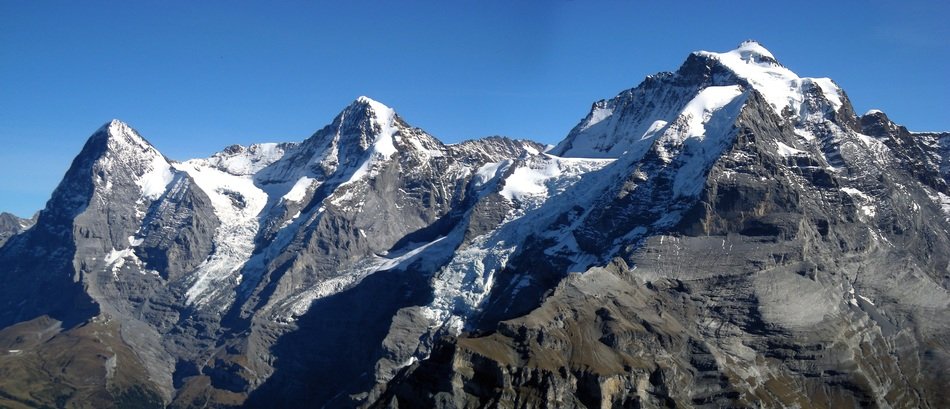 panoramic view of the eiger mountain peak on a sunny day
