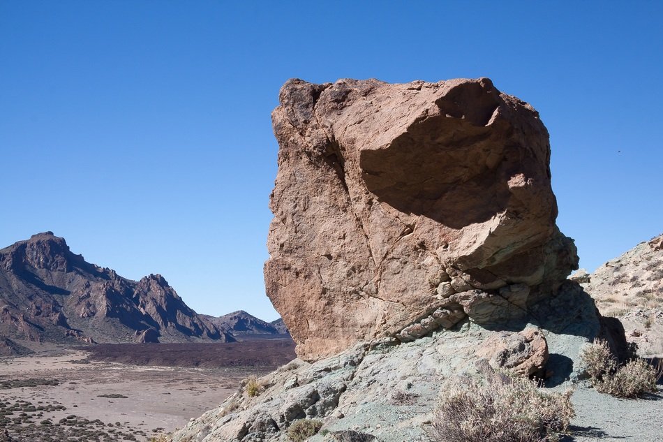 foreground of a stone on a lunar landscape