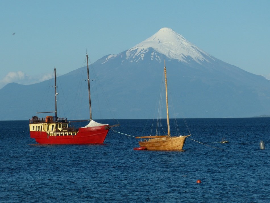 sailing ship on the background of a volcano in chile