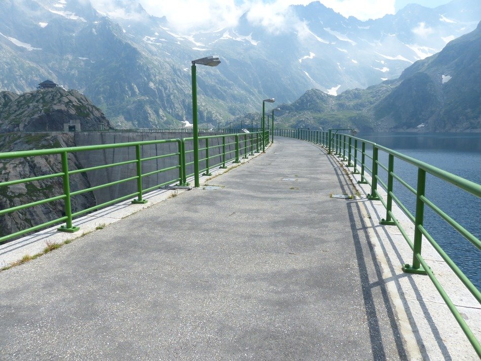Stone road with green railings