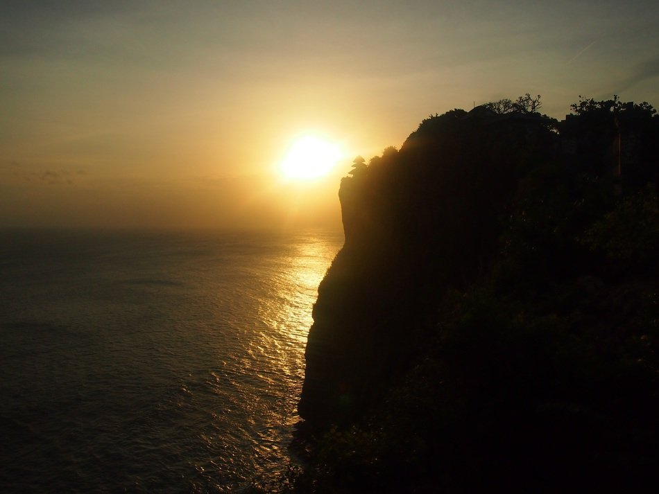 panorama of cliff on bali at sunset