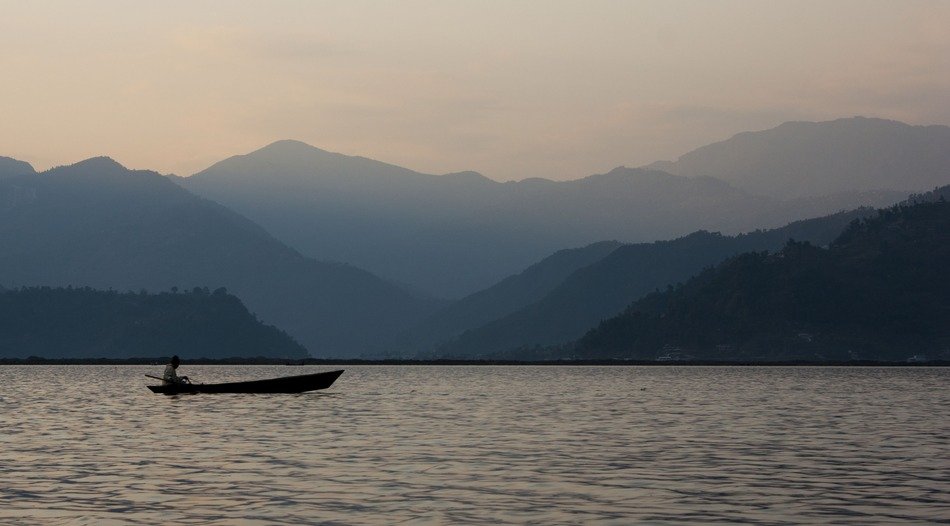 picture of the small boat on a lake