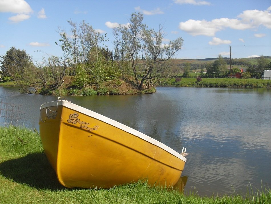 Yellow fishing boat in Scotland
