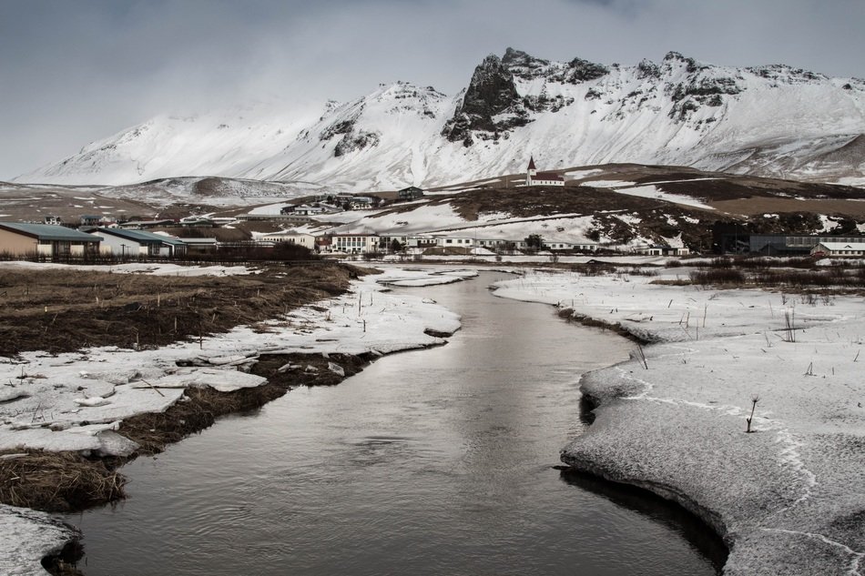 River near thewhite snowy mountains on the landscape