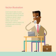 African businessman drinking coffee with a laptop