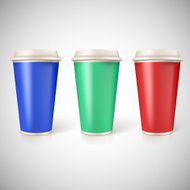 Disposable cups for coffee closeup with multicolored labels