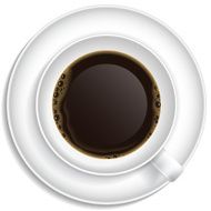 White cup of coffee on white saucer