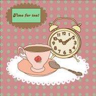 Vintage tea mug saucer spoon and alarm clock on tablecloth