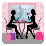 Silhouette of two beautiful girls talking in cafe N2