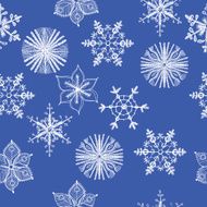 Seamless pattern of different hand drawn snowflakes
