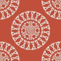 Ornamental round lace pattern on a red background