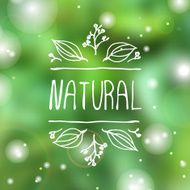 Natural product label on blurred background