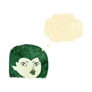 cartoon vampire face with thought bubble N7