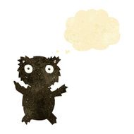 cartoon black bear with thought bubble N7