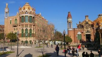 tourists in a square in the center of catalonia