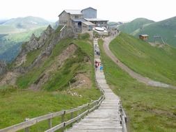 Landscape of long wooden bridge in mountains in France