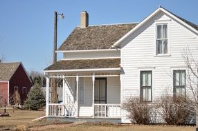 White farmhouse countryside building